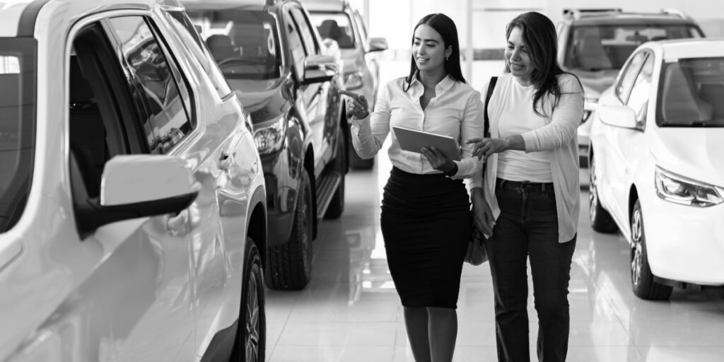 Salesperson discussing vehicle options and financing