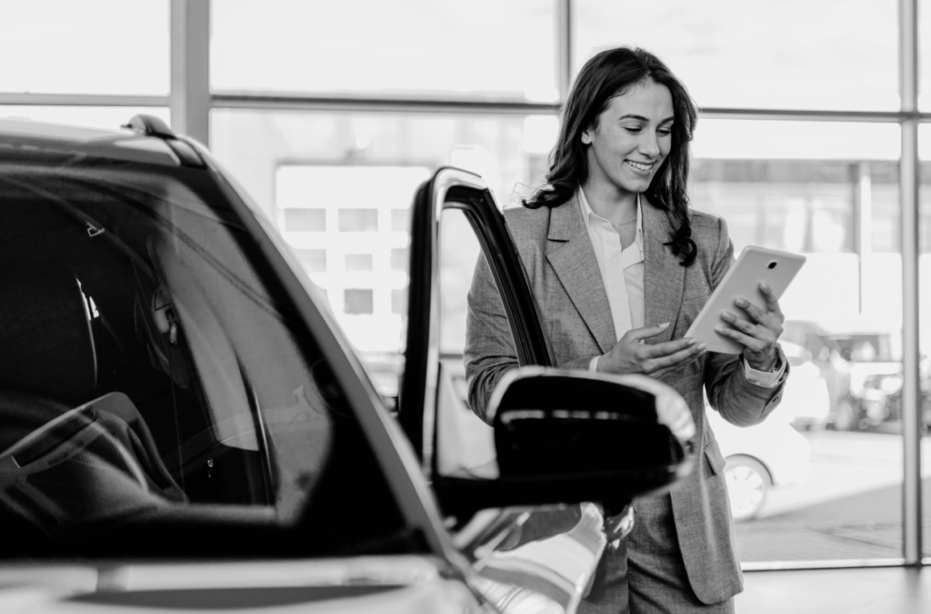 Dealership finance manager reviewing the financing options for their customer